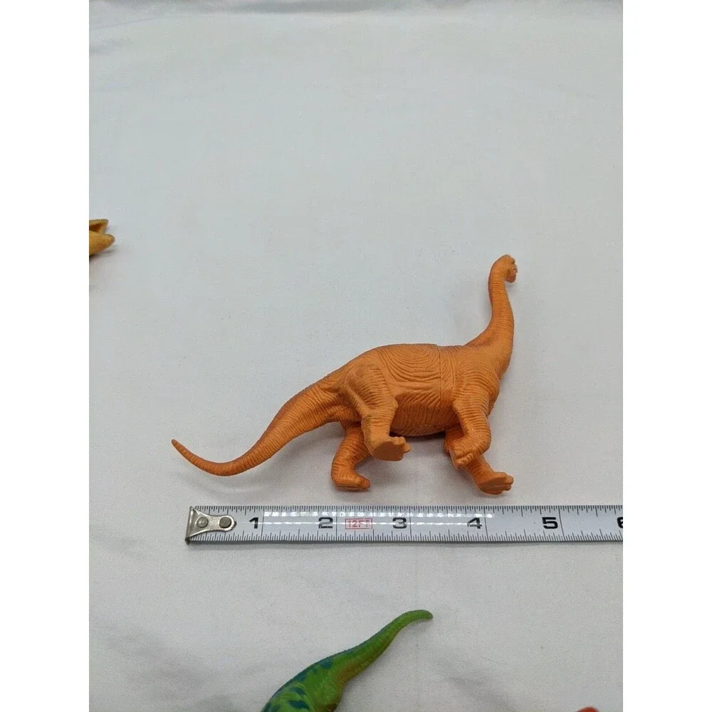 Lot Of (7) Dinosaur Toys Trex Stegasaurs Triceratops